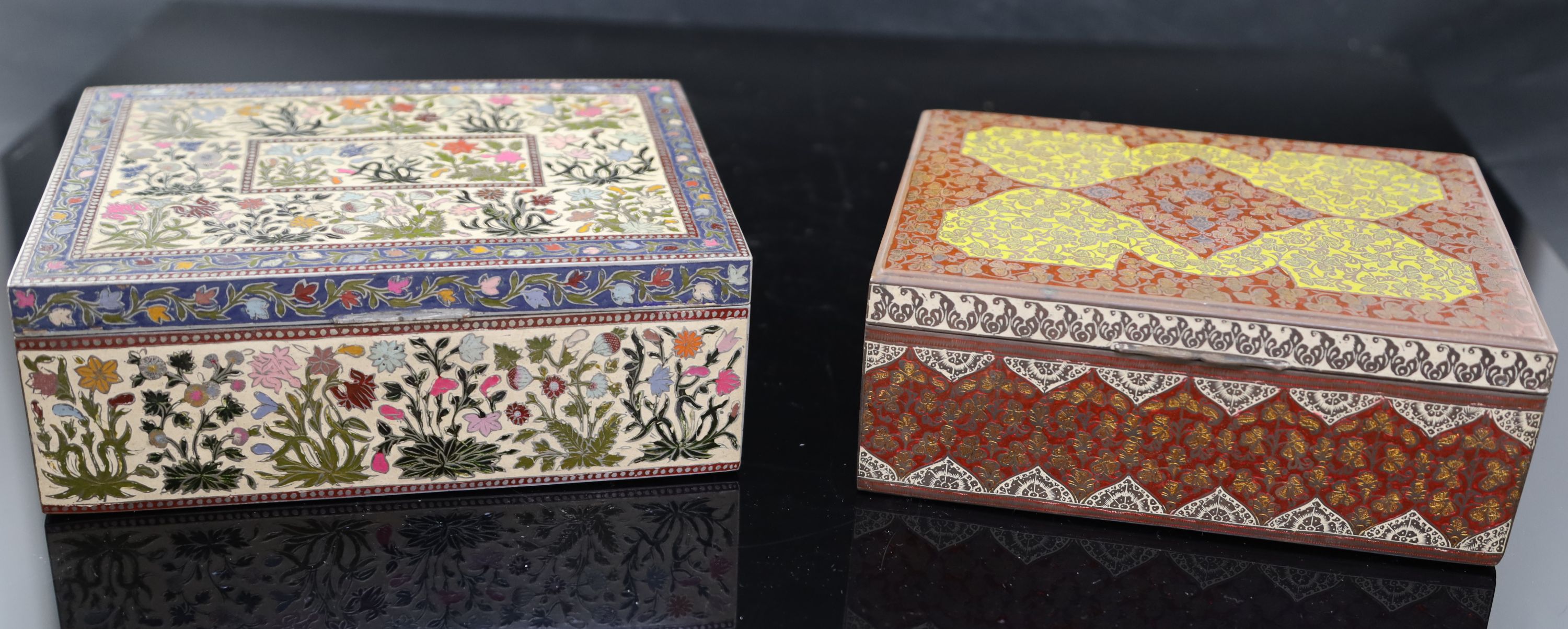 Two late 19th century Indian polychrome champleve enamelled cigar boxes, 22cm and 20cm